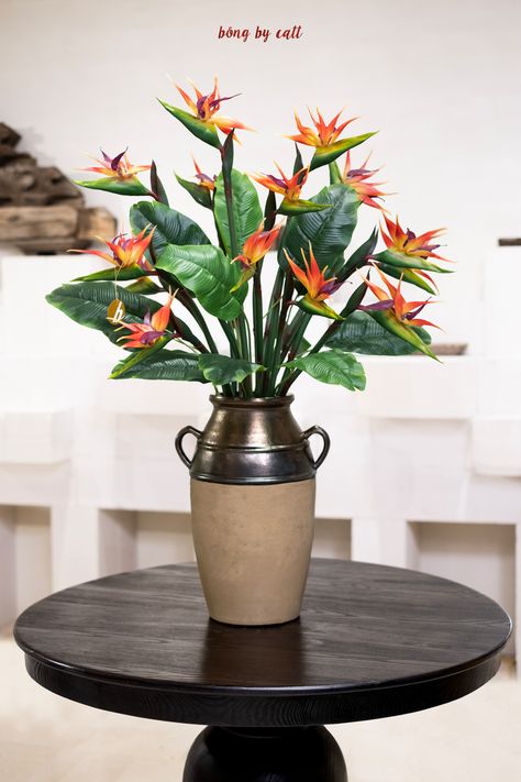 Classy beautiful flower vase made of high-quality silk flowers that will endure forever. Ceramic flower vases complement traditional, Indochine-style interiors.
#artificialflower
#flowergift
#floralarrangement
#flowershop
#floralarrangement Traditional Vase, Beautiful Flower Vase, Traditional Vases, Indochine Style, Flower Vase Making, Ceramic Flower, Bird Of Paradise, Ceramic Flowers, Birds Of Paradise