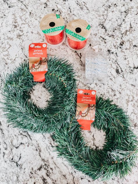 Elevate your kitchen Christmas decor with these DIY cabinet wreaths from Dollar Tree! Hanging cabinet wreaths is easy, cheap, and looks amazing during the holiday. This is Christmas decorating on a budget! Outdoor Christmas Decor On A Budget, Cabinet Christmas Wreaths Diy, Kitchen Cabinet Wreaths Christmas Diy, Christmas Cupboard Decor, Diy Cabinet Wreath, Diy Mini Wreath Christmas, Wreaths For Cabinet Doors, Cabinet Christmas Wreaths, Diy Christmas Cabinet Decor