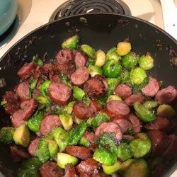 Kielbasa with Brussels Sprouts Recipe - Allrecipes.com Sausage And Brussel Sprouts, Freezing Brussel Sprouts, Kielbasa And Potatoes, Sausage Sauerkraut, Brussel Sprout Recipes, Brussel Sprout Recipes Roasted, Smoked Sausage Recipes, Kielbasa Recipes, Kielbasa Sausage