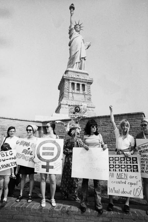 1970 - The Statue of Liberty Has Long Been a Magnet for Protest - A group of women rally at the Statue of Liberty in August, 1970. In the background on the Statue of Liberty reads a banner saying, “Women of the World Unite.” In 1970, feminist Betty Friedan called for a national women’s strike on August 26 to mark the 50th anniversary of the 19th Amendment, which granted U.S. women the right to vote. (Credit: Bettmann Archive/Getty Images). HISTORY Female Empowerment Art, Feminist Protest, Women Empowerment Art, Feminist Artist, Empowerment Art, Feminism Art, Feminist Movement, Women Rights, Riot Grrrl