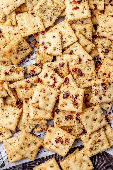 These southern fire crackers are just mini saltine crackers seasoned with olive oil, ranch seasoning, and red pepper flakes for a fun, easy party snack. They're also perfect for movie night or served with your favorite soup or chili. Fire crackers have a bold, zesty, slightly spicy flavor that's seriously addictive! Saltiness Cracker Recipes, Spicey Crackers, Spicy Saltine Crackers, Spicy Saltines, Crackers Seasoned, Seasoned Saltine Crackers, Fire Crackers Recipe, Saltine Cracker Recipes, Southern Fried Okra