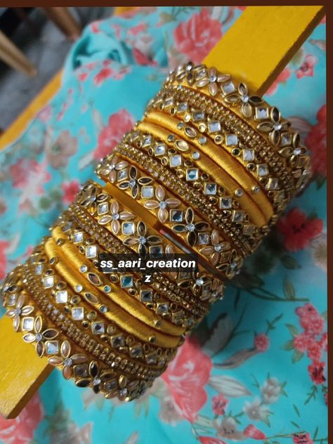 "Discover stunning bridal bangles, unique bangle designs, and exquisite handmade jewelry. Perfect for weddings, festivals, and daily elegance. Kundan Thread Bangles, Silk Thread Bangles Design Kundan, Silk Thread Bangles Design, Thread Bangles Design, Stone Bangles, Bangles Diy, Architectural Jewelry, Unique Bangle, Bridal Braids