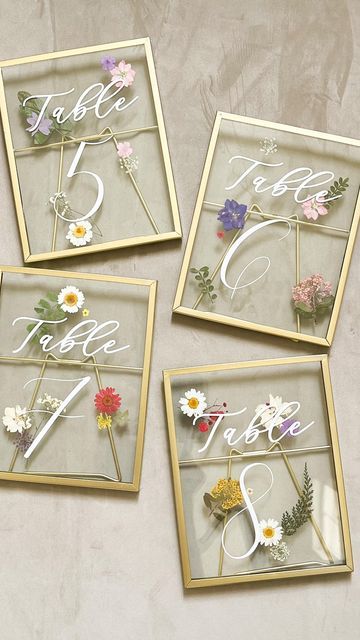 Wedding Stationery on Instagram: "1 🌼 2 🌸 3 🌻 4 🌺 tell me if you’ve ever loved a table number more 🤩 • • • #tablenumbers #pressedflowers #wildflowers #wildflowerwedding #tablescape #weddingtable #weddingtableinspo #springwedding #summerwedding #lookgoodonpaper #lookgoodonpaperco" Dried Floral Table Numbers, Table Numbers Wedding Pressed Flowers, Pressed Flower Wedding Table Numbers, Cool Table Numbers Wedding, Whimsical Table Numbers Wedding, Cute Table Number Ideas, Pressed Floral Table Numbers, Boho Wildflower Wedding Invitation, Wild Flower Table Numbers