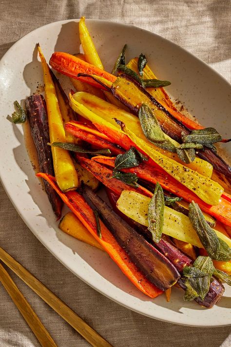 Roasted Carrots with Sage Brown Butter Deserve a Spot on Your Thanksgiving Table Brown Butter Sage Roasted Carrots, Brown Butter Sage Carrots, Butter And Sage Sauce, Sage Brown Butter, Brown Butter Sage, Sage Sauce, Sage Recipes, Roasted Carrots Recipe, Buttered Vegetables