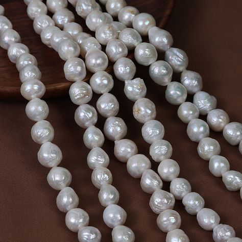 ✨ Discover the charm of wrinkled Baroque Edison pearls! These natural freshwater pearls, with diameters around 10mm, feature beautiful organic textures and natural colors. Each 40cm strand holds pearls with slight variations adding character to your designs. With a 0.7mm hole, they're perfect for creating unique, high-end jewelry pieces. 💎 #EdisonPearls #BaroquePearls #FreshwaterPearls #UniqueJewelry #LuxuryDesigns #NaturalPearls #PearlCrafting #GretaPearls #ElegantJewelry #freshwaterpearlwh... Pearl Jewelry Ring, Multi Strand Pearl Necklace, Pearl Rings Vintage, Pearl Bangle Bracelet, Pearl Charm Bracelet, Edison Pearls, Pearl Chain Necklace, Organic Textures, Pearl Shop