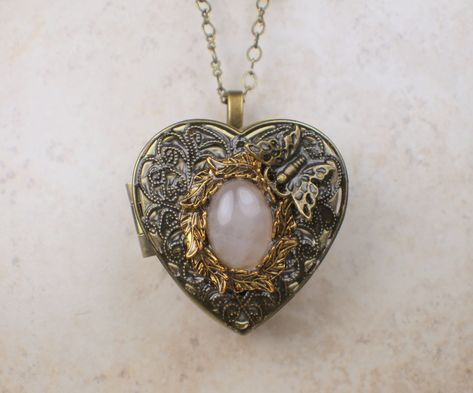 🎶 Unleash the romantic vibes with our Rose Quartz Heart Music Box Locket in Bronze! 💕 Fall in love with its enchanting melody and elegant design, all for just $100.00. 💰 Don't miss out on this perfect gift for yourself or your loved one. 😍 #RoseQuartz #HeartLocket #MusicBox #Bronze #Romantic #Jewelry #GiftIdea #ValentinesDay #Love #Beauty #TrendingNow Music Box Necklace, Music Box Locket, Heart Music, Music Box Jewelry, Box Necklace, Rose Quartz Heart, Dope Jewelry, Rose Quartz Stone, Funky Jewelry