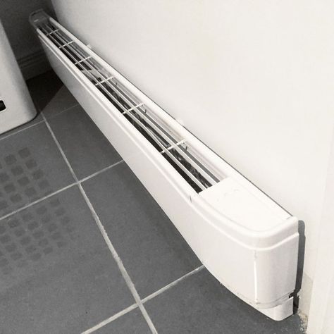 Electric Baseboard Heater Buying Guide | The Family Handyman Bathroom Baseboard, Hydronic Baseboard Heaters, Baseboard Heaters, Electric Baseboard Heaters, Bathroom Heater, Baseboard Trim, Baseboard Heating, Baseboard Heater, Electric Heaters