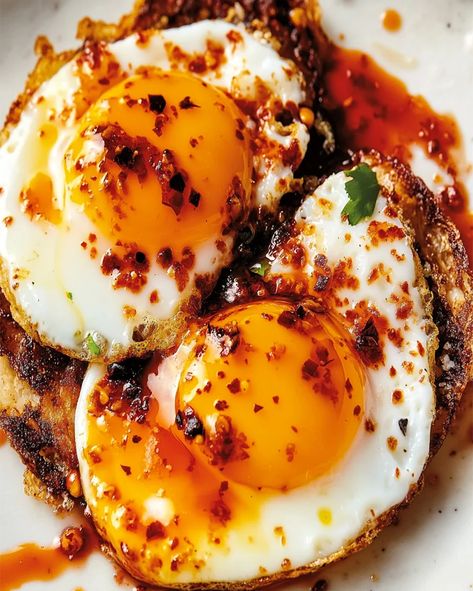 Chili Crisp Fried Eggs Recipe | Quick & Flavorful Breakfast Pork Chop And Eggs, Unique Eggs Benedict, Best Fried Eggs, Chili Crisp Eggs, Feta Chili Crisp Egg, Breakfast Chili, Chili Eggs, Fried Egg Toast, Breakfast Egg Recipes