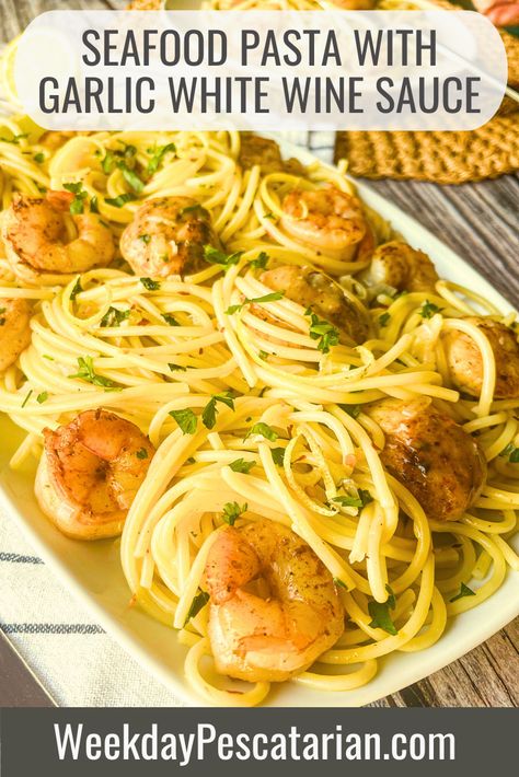 Indulge in a delicious seafood pasta with a savory garlic and white wine sauce - a perfect combination of flavors for a quick and easy dinner. Includes step by step photos and tips for preparing scallops and shrimp for the pasta. Pin this one to your favorite recipe board today! Pasta With White Wine Sauce, Pasta With Wine, Scallops Dinner, Seafood Pasta White Wine, Pasta With White Wine, Seafood Pasta Sauce, Scallop Recipes Pasta, Shrimp And Scallop Recipes, Scallops And Shrimp