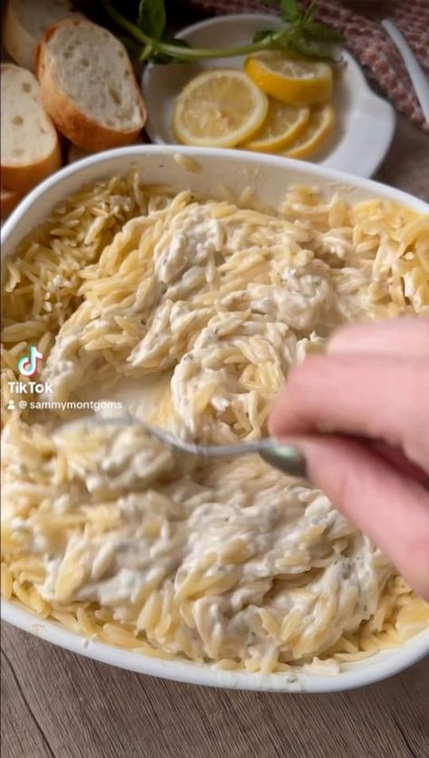 Whip up this simple Lemon and Boursin Orzo Bake, all in a single dish! Packed with the rich flavors of creamy Boursin cheese, tender orzo, and zesty fresh lemon, it's an ideal choice for a quick and tasty weeknight dinner. Enjoy it as a standalone delight or pair it with grilled chicken or shrimp for a complete meal. Salad Recipes Orzo, Orzo Salad Dressing, Cold Orzo Salad, Orzo Salad Recipes Cold, Orzo Salad With Chicken, Boursin Orzo, Easy Orzo Salad, Chicken Orzo Salad, Orzo Casserole