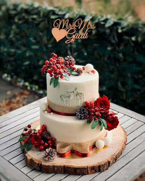 Chic Christmas Wedding Ideas For Your Fairy Tale ★ christmas wedding ideas cake Wedding Cakes Christmas Theme, Wedding Favors Christmas, Holiday Wedding Cake, Wedding Cake Christmas Theme, Simple Christmas Wedding Cake, Christmas Vow Renewal Ideas, Christmas Theme Wedding Cake, Small Christmas Wedding Ideas, Christmas Themed Wedding Cake