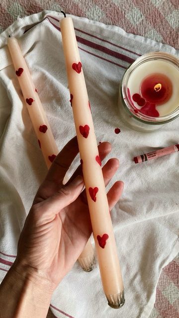 Laura Prietto on Instagram: "Make your own heart taper candles with a just a crayon 🕯️🖍️❤️ These would make for a great valentine’s day gift or a fun galentine’s night activity! They were easy to make and I love the pop they add to our decor 💕 . . . #paintedcandles #tapercandles #valentinesdiy #valentinescandles #diytapercandles #valentinescraft #galentinesparty #galentines #candlepainting" Painted Candles Valentines, Galentines Candle Party, Galantines Ideas Crafts, Valentines Crafts Decorations, Thrifted Valentines Gift, Valentines Craft Girls Night, Taper Candle Crafts, Valentines Decor Aesthetic, Valentines Crafts For Adults Diy