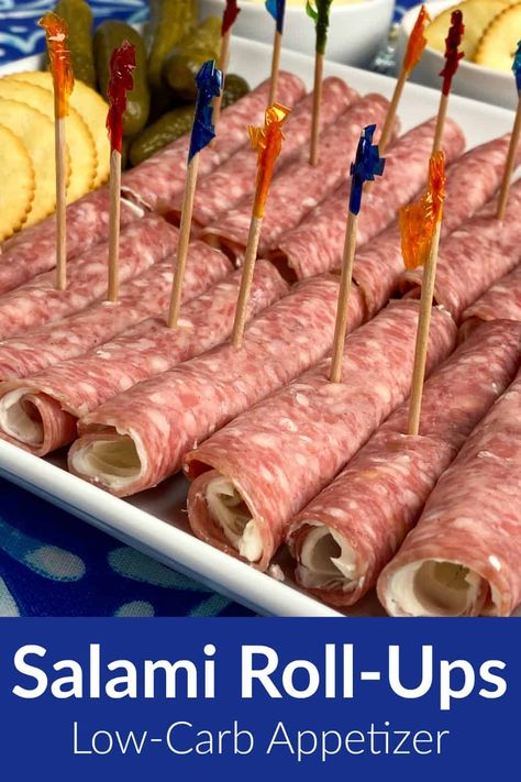 Cream cheese spread on salami and rolled up makes one of the best low-carb and keto snack recipes we’ve eaten! Perfect for grazing at a family holiday meal or enjoying at a party these snacks can be made ahead of time and are easy to transport over a long distance. There's something fun about finger food with a frilly toothpick that can be eaten in just a few bites. Spreading cream cheese inside each slice of salami helps it stick together as it is rolled or folded. Charcuterie Roll Ups, Card Party Snacks Appetizers, Easy To Transport Appetizers, Easy Appetizers For A Party Make Ahead, Salami Roll Ups, Salami Appetizer, Glamping Camper, Baptism Brunch, Salami Rolls