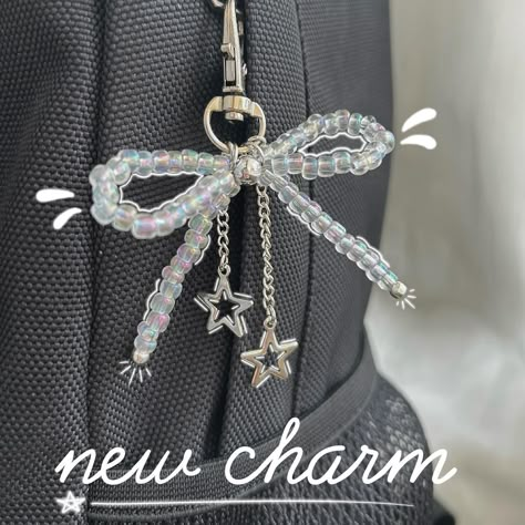 We’ve released our first bow bag charm!! #phonecharm #handmade #keychains #bow #keychain #smallbusiness #etsy #etsyshop #charm #phoneaccessories #beads #aesthetic #business #coquette #bowaccessories #coquetteaesthetic #coquettefashion #bows #cute #jewelry #jewelrymaking #fyp #foryou #explore #trending #viral #socal #la #losangeles Bow Keychain Beads, Aesthetic Bag Keychains, Backpack Charms Aesthetic, Diy Aesthetic Keychain, Bow Bag Charm, Aesthetic Keychain For Backpack, Sewing Keychain Ideas, Bow Phone Charm, Beads Bag Charm