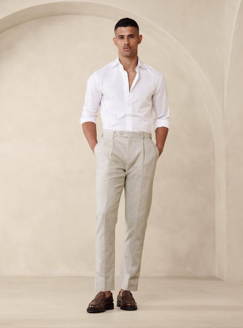 Polished and professional look with a timeless white dress shirt, sophisticated beige pleated pants, and elegant dark brown loafers. Ideal for a refined ensemble that balances classic style with modern elegance. Mens Wedding Guest Outfit, Wedding Guest Outfit Men, Wedding Guest Men, Linen Pants Suit, Beach Formal, Formal Wedding Attire, Rehearsal Dinner Outfits, Linen Pants Outfit, Beach Wedding Attire