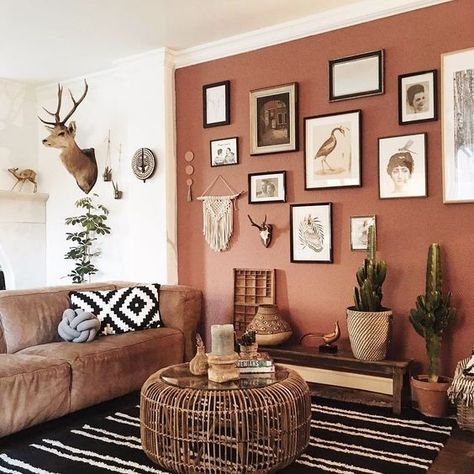 a gorgeous boho living room with a terracotta wall, a gallery wall, some cacti in pots, a leather sofa and a wooven table Remodel Stairs, Interior Hallway, Remodel Farmhouse, Corner Sofa Set, Decor Entryway, Interior Bedroom, Decor Themes, Remodel Bedroom, Boho Living Room