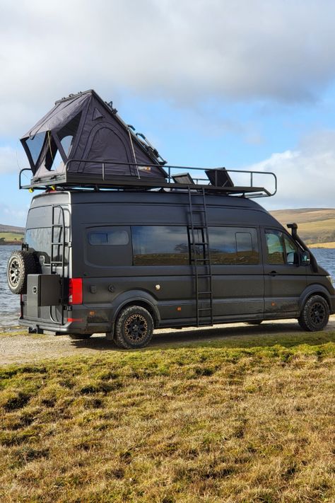 This is van life at its finest: MAN TGE 4x4 campervan, equipped with a bespoke roof rack, TentBox, external storage box, and built-in sun loungers on the roof deck.   This is 'The Lion', a custom van conversion build which sleeps and seats 5. The exterior is hot property, but the interior is as cool as a luxury ski chalet in The Alps.  If you dream of exploring in style and comfort, pin this as your ultimate camper van inspiration! Camper Van Roof Bed, Van Roof Deck, Mini Van Camper, Build Camper Van, Campervan Exterior, Luxury Camper Van, Ski Lodge Interior, Van Luxury, 4x4 Van Conversion