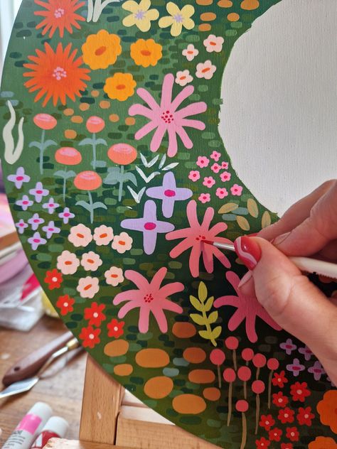 Something I've been working on 🌸 My latest work-in-progress captures a meditative journey through tiny, colorful flowers on a circular canvas. Each stroke was a tiny therapy for me honestly! Want to see how it all comes together? Follow me on Instagram @tinkoutsidethebox to explore more colourful abstract and contemporary artworks that soothe the soul. Click through the link to follow my journey. Diy Flower Canvas Painting, Acrylic Painting Doodles, Tiny Painted Flowers, Abstract Colourful Art, Paint A Pot Ideas, Homemade Artwork, Gouache Abstract, Acrylic Art Paintings, Togetherness Design