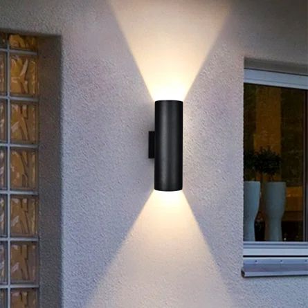 Ivy Bronx Manseau 2 - Bulb Matte Black Outdoor Armed Sconce | Wayfair Modern Black Outdoor Light Fixtures, Up/down Light Wall Sconces, Outdoor Lighting Black, Exterior Sconces Modern, Modern Garage Lights, Modern Garage Lights Exterior, Garage Lights Outside Exterior, Exterior Lights On House Modern, Garage Sconces Outdoor Lighting