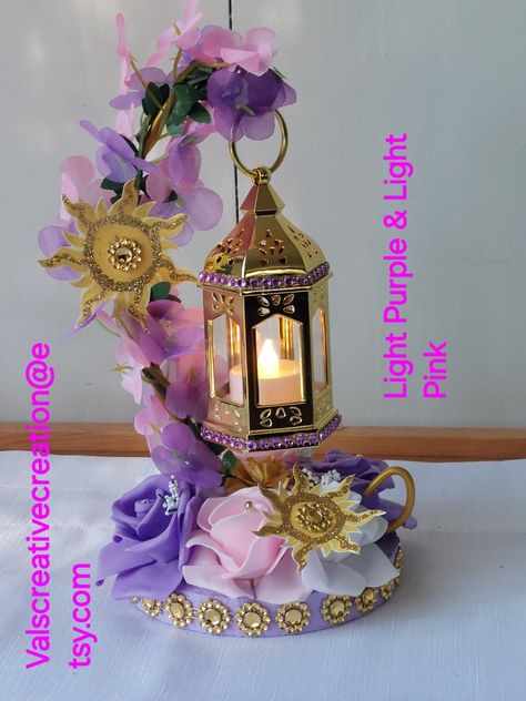 Rapunzel Centerpiece Ideas Diy, Tangled Centerpieces Quince, Tangled Theme Quinceanera Centerpieces, Tangled Table Decorations, Repunzel Quince Theme Centerpieces, Rapunzel Centerpiece Ideas Quince, Rapunzel Graduation Party, Purple Quinceanera Ideas Decoration, Repunzle Sweet 16 Theme