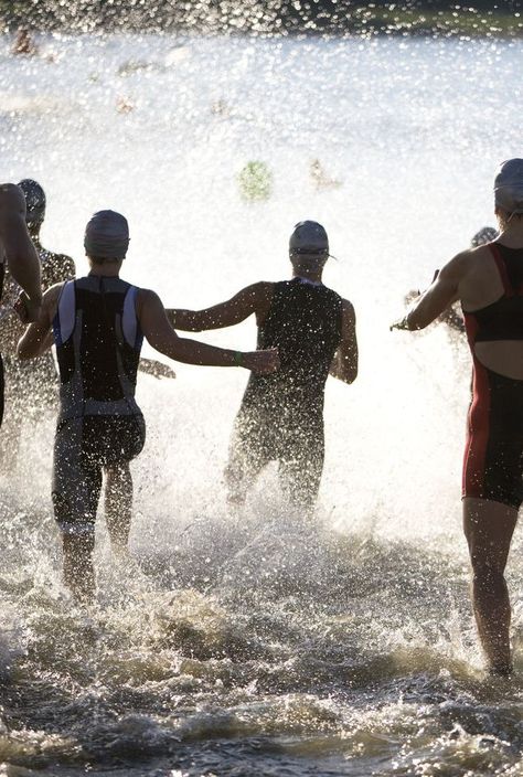 Triathletes At Start of Triathlon Running Into The Water. Triathlete Women, Triathlon Aesthetic, Sprint Triathlon Training Plan, Ironman Triathlon Motivation, Sprint Triathlon Training, Ironman Triathlon Tattoo, Triathlon Training Program, Triathlon Training Plan, Triathlon Tattoo