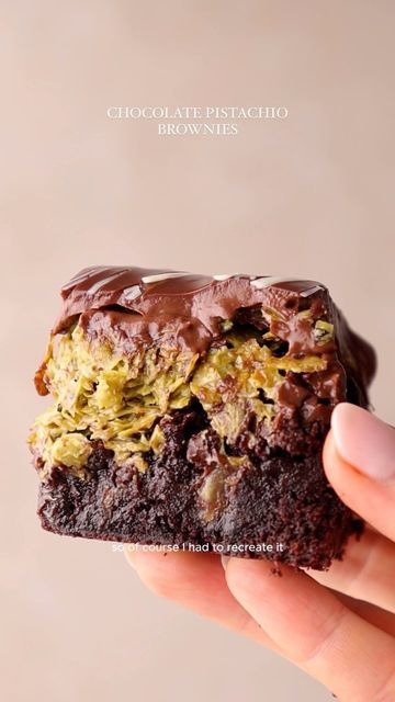 Rosie Brown on Instagram: "Pistachio Chocolate Brownie 🤎 (egg free + dairy free)   Inspired by the viral Dubai Chocolate Bar this brownie is rich and fudgey filled with pistachio butter and crispy toasted pastry pieces. Covered in a thick chocolate ganache drizzled with white chocolate this brownie is the definition of indulgence.  INGREDIENTS Brownie 150g dark chocolate (min 50% cocoa) 140g plain flour 200g caster sugar 50g light brown sugar 120g dairy / dairy free butter 120g dairy / dairy free milk 60g dark cocoa powder Filling 200g pistachio paste / butter 1 tbsp butter 200g filo pastry, shredded Topping 125g dairy free / dairy dark chocolate 100g dairy free / dairy double cream 50g dairy free / dairy white chocolate, melted INSTRUCTIONS Line and lightly grease a 15cm square baking tr Dubai Chocolate Brownies, Thick Chocolate Ganache, Pistachio Brownies, Dark Chocolate Pistachio, Dairy Free Butter, Pistachio Paste, Pistachio Chocolate, Dubai Chocolate, Dark Chocolate Recipes