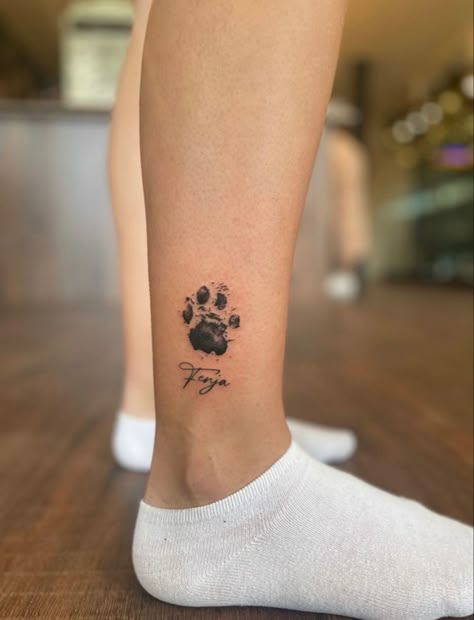 Tattoo With Dog Paw Prints, Dog Paw Tattoos For Women Ankle, Cute Dog Tattoos For Women, Real Dog Paw Print Tattoo, Paw Print With Name Tattoo, Dog Ankle Tattoos For Women, Dog Ball Tattoo, Dog Memorial Tattoos Paw Print, Dog Ankle Tattoo