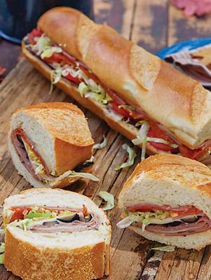 Toasted Italian Sub Sandwich - Paula Deen French Bread Italian Subs, Italian Subs Sandwich Baked, Party Foods Easy, Lake Snacks, Sandwiches For A Crowd, Italian Sub Sandwich, Hoagie Sandwiches, Field Meals, French Bread Loaf