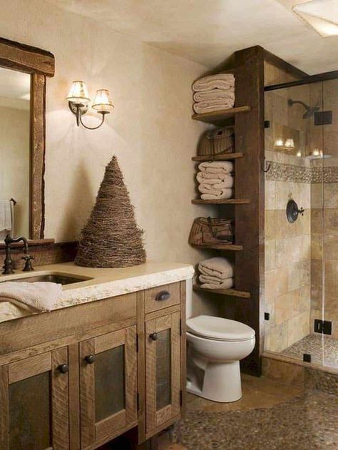 27 Beautiful Rustic Bathroom Design Ideas For A Welcoming Oasis Restroom Cabinets, Rustic Country Bathroom, Country Style Bathrooms, Rustic Bathroom Lighting, Country Bathroom Decor, Farmhouse Bathroom Design, Rustic Farmhouse Bathroom, Farmhouse Bathroom Decor Ideas, Rustic Bathroom Designs