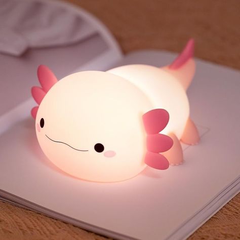 ✨ Looking for the perfect adorable night light for your little one's room? 🌙 Meet the Pink Axolotl Night Light – a soft silicone friend that brings a magical glow to any nursery or bedroom! 🌸 This rechargeable touch lamp is easy to use and adds a soothing ambiance, making it a must-have for toddlers and kids alike. 🦕 Whether it's a gift for a baby shower, birthday, or just because, this cuddly creature will bring smiles. 🎁💖 #NurseryDecor #AxolotlLove #GiftIdeasForGirls #SoftGlow Animal Light, Cute Axolotl, Led Night Lamp, Kids Night, Light Eyes, Touch Lamp, Night Lamp, Touch Control, Night Lamps