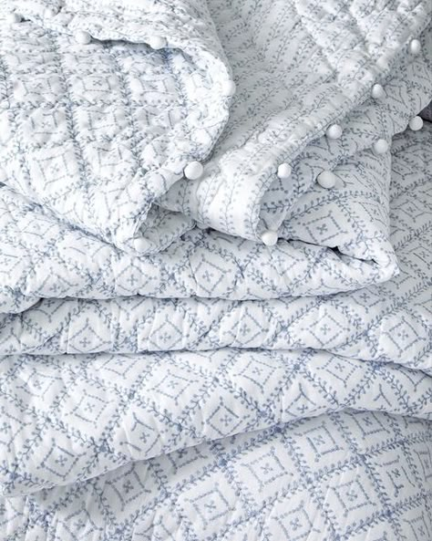 The White Company on Instagram: "Our strking Hambledon Quilt is made from pure cotton and hand-quilted. The beautiful blue-and-white patterns are finished with a hand-applied pom-pom trim and a contrasting design on the reverse. Just the thing for giving your bed a fresh update. Tap to Shop #thewhitecompany" Blue Bed Covers, Quilt Cushion, Blue Bed, Coastal Room, Dorm Room Inspiration, Bed Quilt, Cover Bed, White Company, Pom Pom Trim