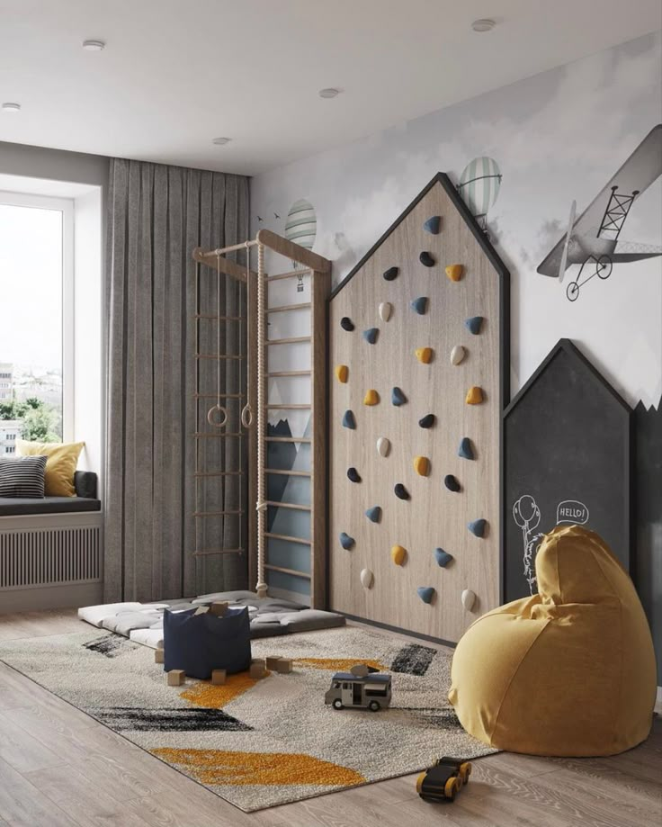 a child's bedroom with climbing wall and bean bag chair in the corner,