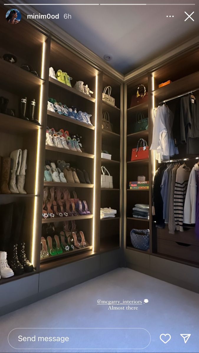 a walk in closet with lots of shoes and handbags on the shelves next to it