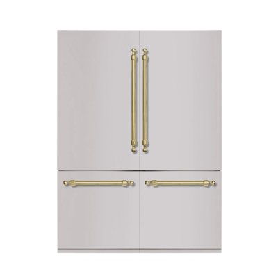 a white refrigerator freezer with gold handles