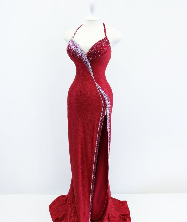 a red dress with silver sequins on the side