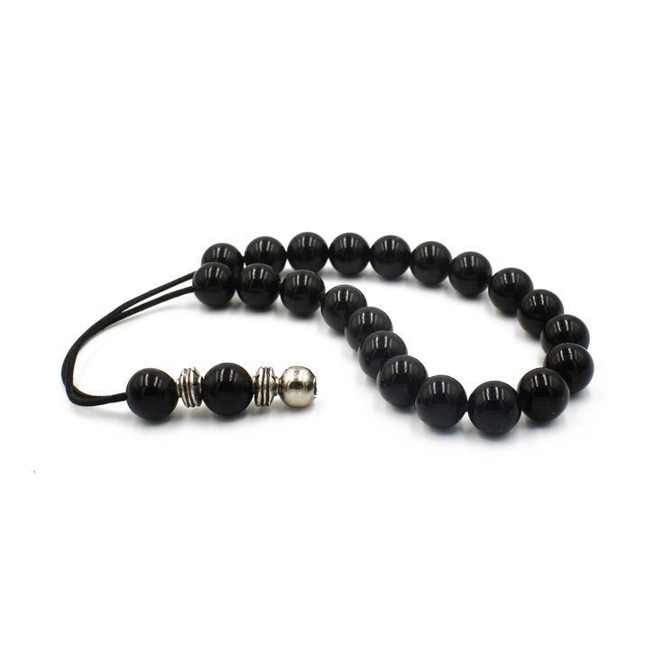 "Handcrafted Komboloi - Worry Beads created from 23 Black Onyx Beads in round shape. A pocket size set of worry beads which can be used for passing time and relaxation. Item can be made with different cord color. Please choose the cord color you would like from the drop down menu. Features: Item length: approx. 22cm / 9\" Bead size (approx.): 10mm / 0.39\" Bead type: Onyx Metal materials: Silver tone base alloy ☆ Here you can browsemore items in our shop: https://www.etsy.com/shop/sunnybeadsbyth Adjustable Black Beads For Gifts, Handmade Adjustable Onyx Beads, Bohemian Black Bracelet With Polished Beads, Bohemian Black Bracelets With Polished Beads, Black Bohemian Bracelet With Polished Beads, Adjustable Black 8mm Beads, Handmade Black Onyx Beads, Traditional Black Gemstone Beads, Traditional Black Adjustable Beaded Bracelets