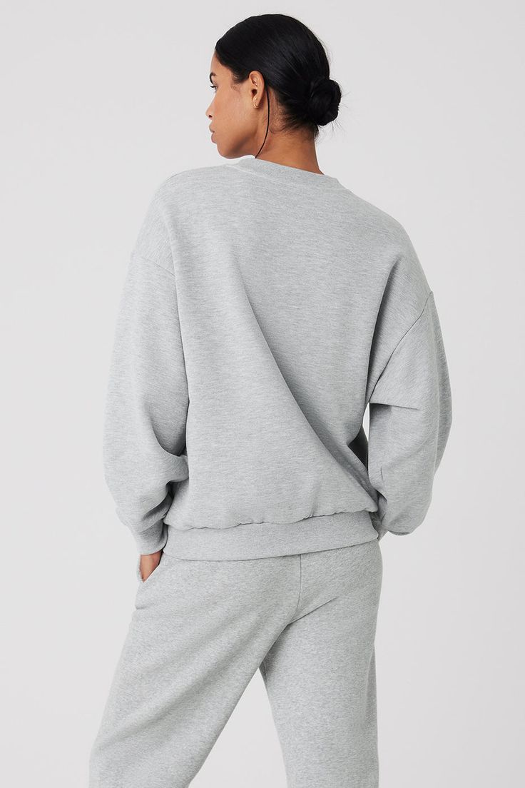 This best seller is cozy, comfortable, cute and done in classic neutrals and on-trend colors—each finished with a chrome Alo logo. It has a classic crewneck, ribbed cuffs and hem, and a laid-back dropped-shoulder fit. It’s made from midweight French terry that’s smooth on the outside and fleecy on the inside with the perfect drape. Pair with the Accolade sweatpants to make a matching set—and get one for your bestie, sibling, or partner, if you’re into that. Find your fit and see all the ways to Comfy Crew Neck Sweater With Ribbed Cuffs, Comfy Sweater With Ribbed Cuffs And Crew Neck, Gray Crew Sweats With Ribbed Cuffs, Gray Crew Neck Sweatshirt With Ribbed Cuffs, Cozy Gray Sweats With Ribbed Cuffs, Comfortable Crew Neck Sweater With Ribbed Cuffs, Classic Gray Sweatshirt With Ribbed Cuffs, Solid Color Crew Sweats For Fall, Gray Sweater With Ribbed Cuffs And Relaxed Fit