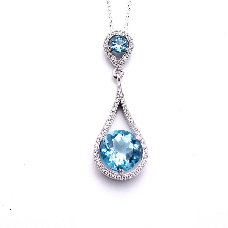 Gold & diamond Blue Topaz pendant necklace, made of white gold and set with center Blue Topaz & diamonds, Can become an incredible gift to your lovely person. Classic pendant, great present . Summer collection. Gemstone: Blue Topaz - 2 pc. Diamond- 51 pc. - total 0.27 carats Metal: White Gold 14k Available metals: Yellow Gold 14k Weight: 4.00 gram Catalog code: PH-4061WS Condition: New Designer: Cohen Jewellers Free shipping 1-3 business days shipping Fine Jewelry Blue Topaz With Pave Setting, Blue Topaz Jewelry With Pave Setting For Anniversary, Blue Diamond Pendant Necklace In Sterling Silver, Fine Jewelry Blue Topaz Teardrop Pendant Necklace, Blue Topaz Teardrop Pendant Necklace Fine Jewelry, Elegant Blue Topaz Teardrop Pendant Necklace, Elegant Blue Topaz Necklaces With Accent Stones, Elegant Blue Topaz Necklace With Accent Stones, Formal Blue Topaz Teardrop Pendant Necklace