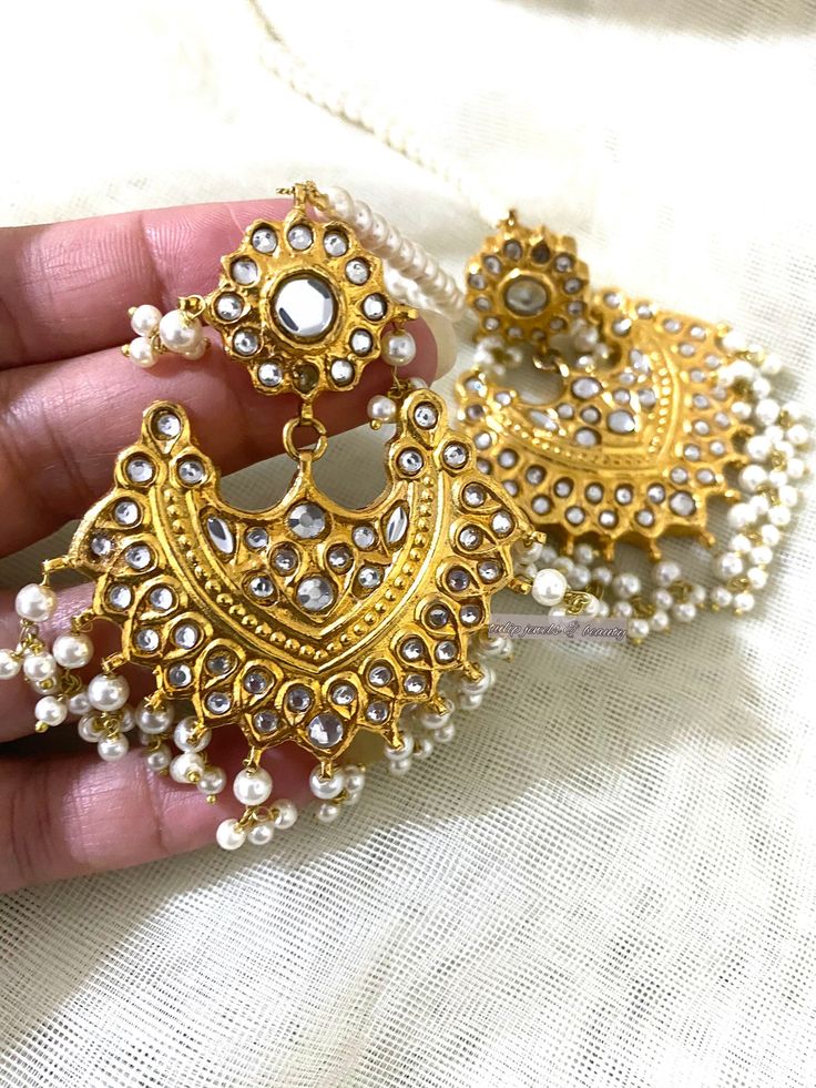 Thappa kundan earrings. Emblished with kundan and pearls.   Gold plated on high quality brass.  Please check shop policy before purchase. Kundan Pearl Earrings With Stone Work For Festivals, Kundan Pearl Earrings With Stone Work For Celebrations, Festive Heavy Kundan Pearl Earrings, Kundan Meenakari Dangle Pearl Earrings, Diwali Kundan Pearl Earrings With Stone Work, Kundan Stone Work Earrings For Diwali, Traditional Heavy Kundan Pearl Earrings, Bollywood Style Kundan Pearl Earrings With Meenakari, Temple Style Kundan Bridal Earrings For Celebrations