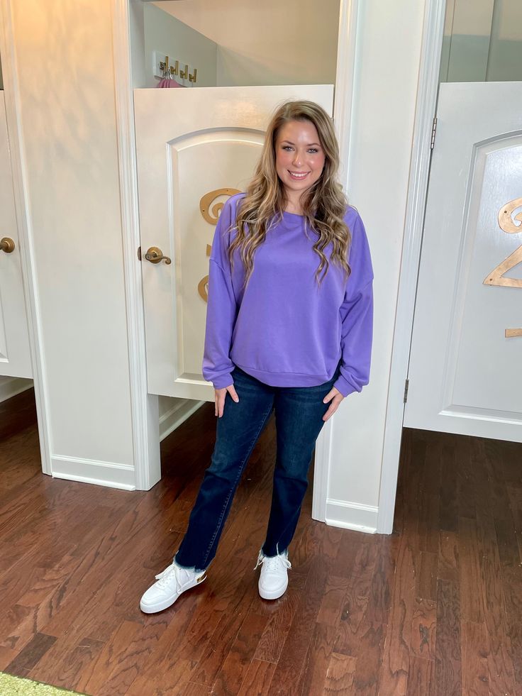 Stay cozy and stylish with the Fiby Sweatshirt. With its oversized fit and playful purple hue, this crewneck sweatshirt is perfect for adding a pop of color to your wardrobe. Made from a comfortable blend of 80% cotton and 20% polyester, it's the ultimate combination of fashion and comfort. Sizing: runs true to size; size chart included in the photos Casual Lavender Sweater For Fall, Lavender Crew Neck Sweater For Fall, Heather Relaxed Fit Sweatshirt For Loungewear, Casual Heather Long Sleeve Sweatshirt, Heather Casual Crew Neck Sweatshirt, Casual Heather Crew Neck Sweatshirt, Purple Sweater With Ribbed Cuffs For Spring, Casual Purple Sweatshirt For Fall, Purple Relaxed Fit Sweater For Loungewear