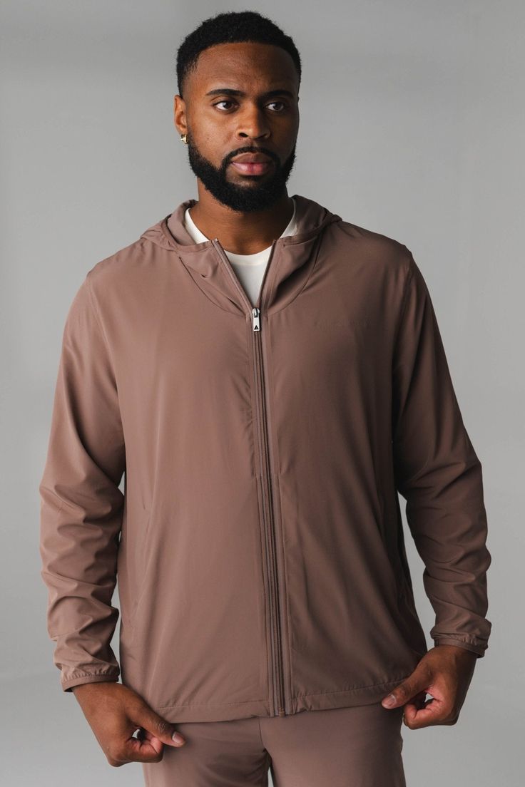 The Prime Windbreaker is the perfect layering piece to throw on top of your favorite outfit. This jacket offers functionality and comfort while also providing a sporty look to add to your wardrobe. Mens Windbreaker, Sporty Look, Layering Pieces, Mocha, Favorite Outfit, Fabric Design, Hoodies Men, Layering, Sleeve Length