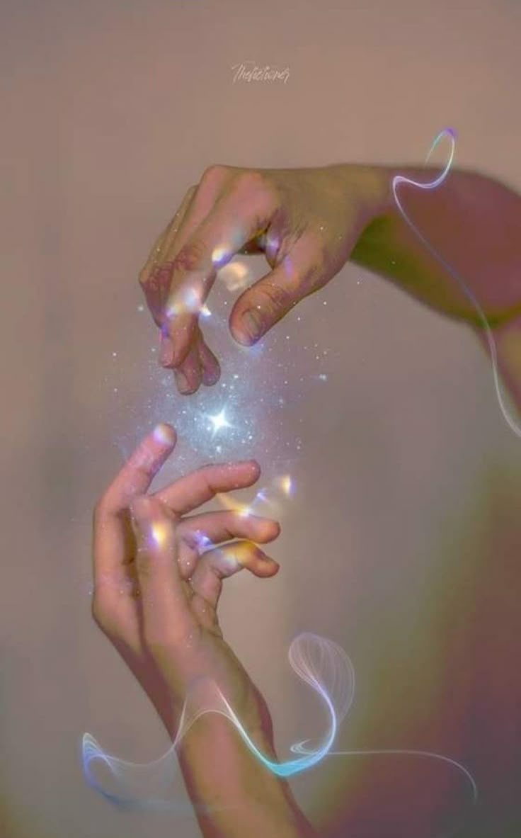 two hands reaching towards each other to touch something with their fingers and touching the stars