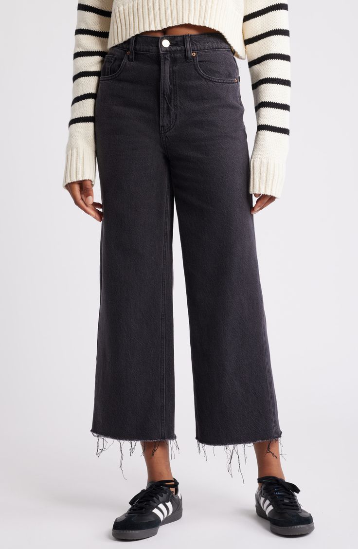 Fall for the cropped wide-leg silhouette of these season-perfect nonstretch jeans punctuated with raw hems. 26" inseam; 21" leg opening; 12 1/2" front rise; 16 1/2" back rise (size 29) Zip fly with button closure Five-pocket style 100% cotton Machine wash, tumble dry Imported Black Wide Leg Jeans Outfit, Black Cropped Jeans, Black Wide Leg Jeans, Wide Leg Jeans Outfit, Crop Jeans, Really Cute Outfits, Jeans Outfit, Free Fabric, Black Fits