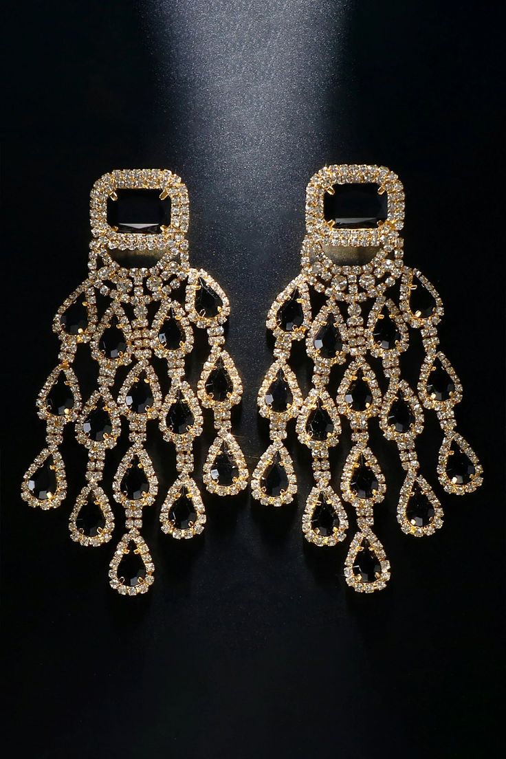 Elevate your style with our Diamond Floral Fringe Earrings. These stunning earrings showcase intricate diamond-encrusted floral designs with delicate fringe details. The combination of diamonds and cascading fringes adds a touch of sophistication and movement, making them a perfect accessory for special occasions. Embrace a look that effortlessly blends luxury and trendiness with these captivating earrings. Glamorous Gold Tassel Earrings For Wedding, Glamorous Tassel Earrings For Wedding, Rhinestone Chandelier Drop Earrings, Dangle Tassel Earrings With Rhinestones For Evening, Evening Dangle Tassel Earrings With Rhinestones, Glamorous Crystal Tassel Earrings With Rhinestone Fringe, Crystal Earrings With Rhinestone Fringe For Evening, Gold Crystal Tassel Earrings For Evening, Glamorous Evening Tassel Earrings With Rhinestones