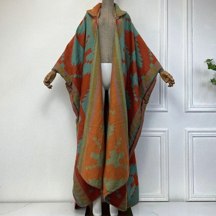 This super soft and warm wool cardigan kimono is perfect for the cold weather. Unlike other sweaters and wools, the wool used for this beauty is non itchy. Think of your favorite throw blanket, the comfort and warmth it gives but 10x stylish and wearable any where. This kimono is all that and more! One size fits S-4X Material: Wool One Size Fits Most Size Chart Cozy Long Acrylic Outerwear, Bohemian Brown Sweater Coat For Fall, One-size Bohemian Outerwear For Cold Weather, Green Casual Shawl For Fall, Bohemian Soft Knit Outerwear, One Size Bohemian Outerwear For Cold Weather, Casual Green Shawl For Fall, Bohemian One-size Outerwear For Cold Weather, Bohemian Soft Knit Cardigan