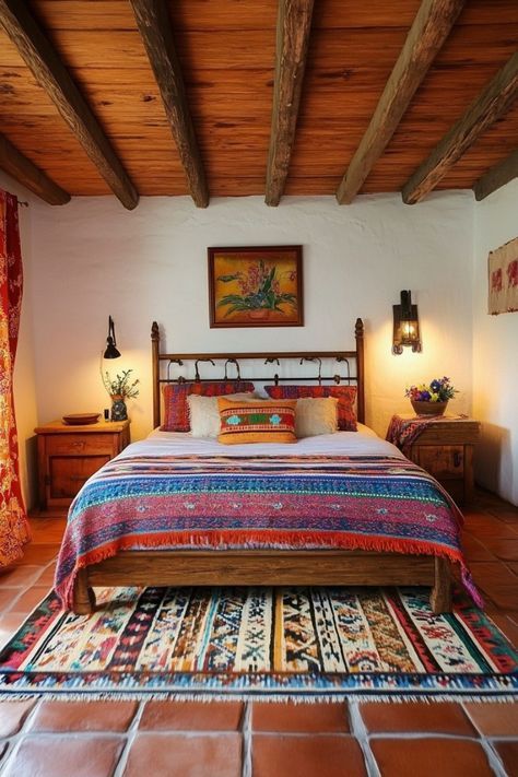 a bed sitting in a bedroom next to a wooden table and lamp on top of a rug