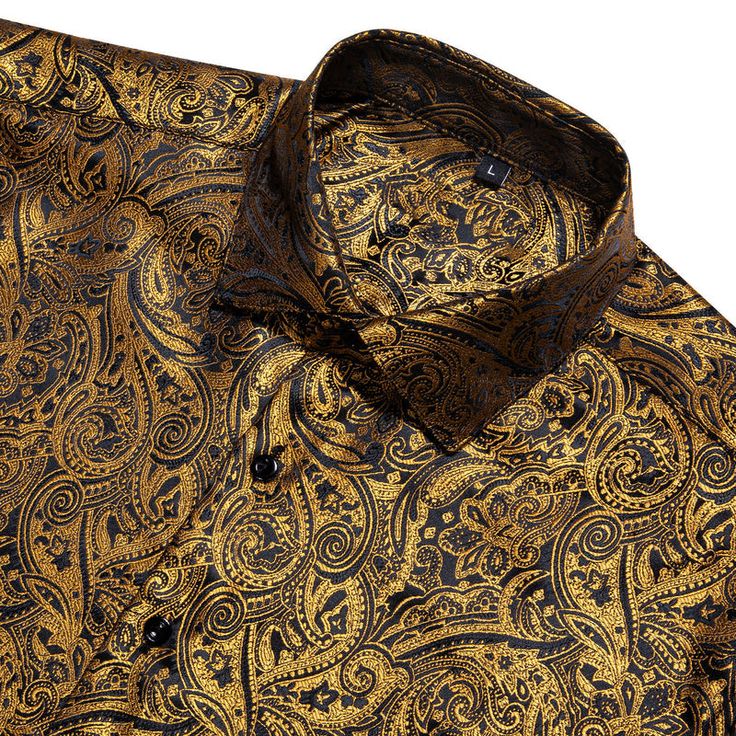 Add a touch of luxury to your wardrobe with the Black and Gold Paisley Silk Short Sleeve Shirt. Expertly crafted from premium silk, this shirt offers an exceptionally smooth and comfortable feel, making it perfect for any sophisticated occasion. The elegant black fabric is beautifully enhanced by a stunning gold paisley pattern, creating a striking visual contrast that exudes opulence and style. Perfect for upscale casual events, summer gatherings, or evening outings, this short sleeve shirt sea Christmas Dances, Autumn Winter Fashion Casual, Upscale Casual, Gold Paisley, Suit Shirt, Summer Gathering, Button Down Dress Shirt, Musical Band, Fathers Day Sale