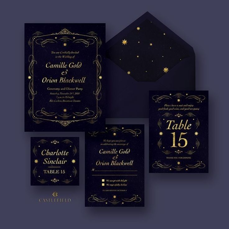 a set of wedding cards and envelopes with gold foil on black paper, surrounded by golden stars