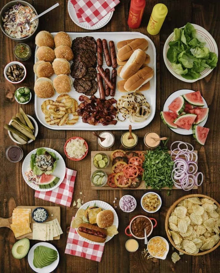 a wooden table topped with lots of food