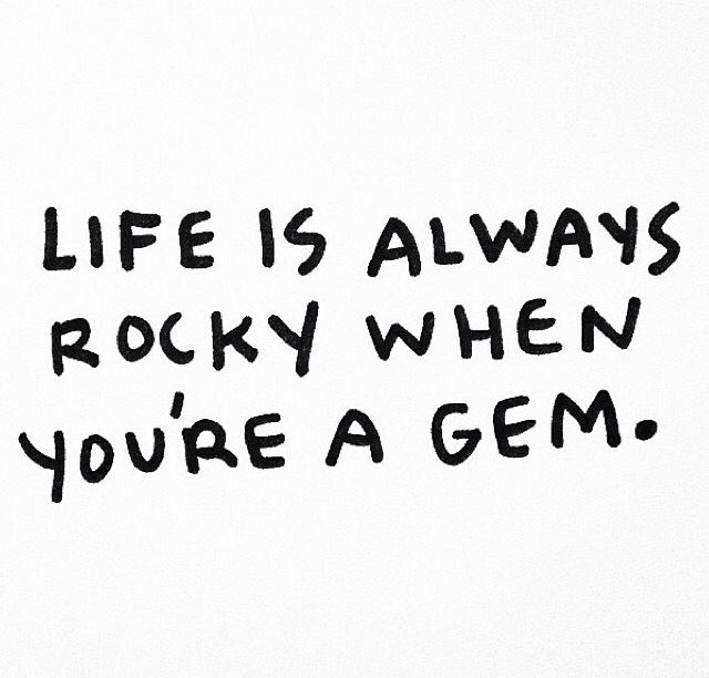 the text on the phone says life is always rocky when you're a gen